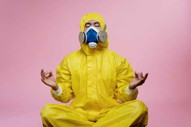 man in yellow protective suit